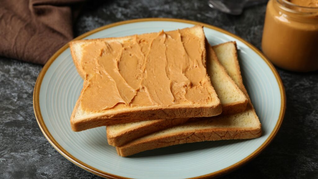 Whole toast bread and peanut butter for cravings