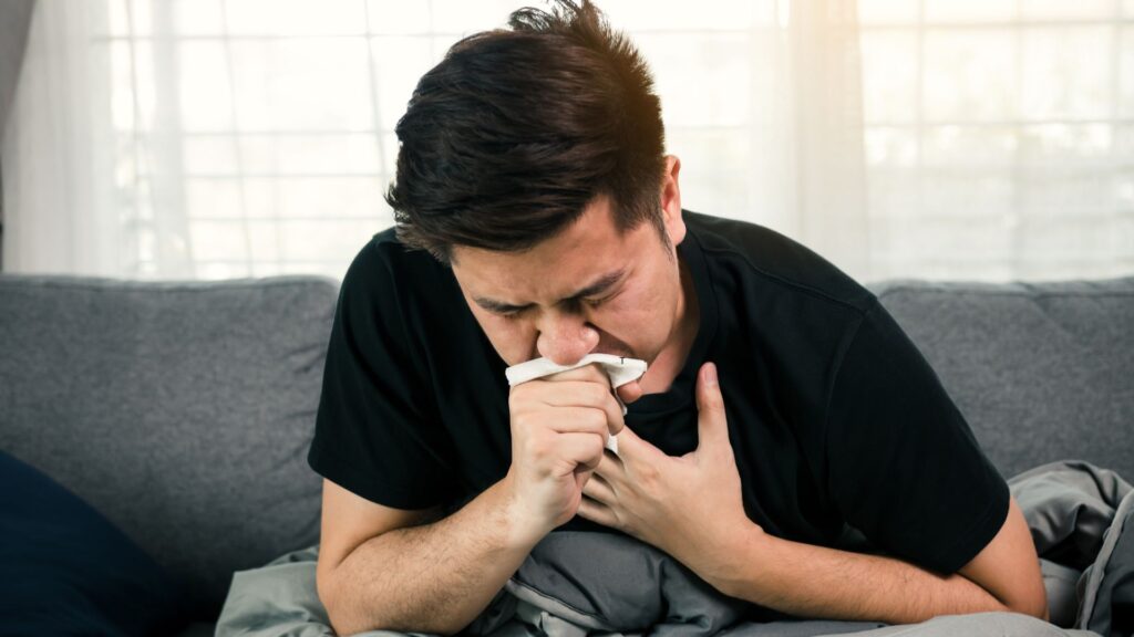 Man coughing